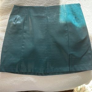 Dark teal mini skirt with slit